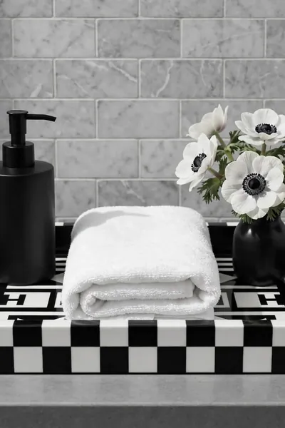 Black and white monochrome tray on gray counter