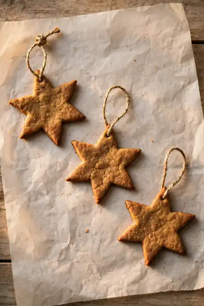 Cinnamon star ornaments on parchment paper
