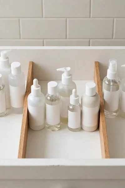 Bathroom drawer with bottles stored upright like files