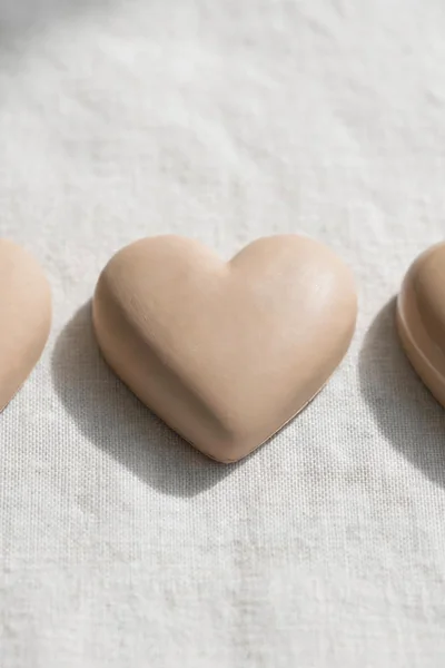 Matte, satin, and gloss clay hearts