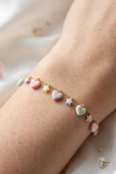 Mini charm clay bracelet on gold chain
